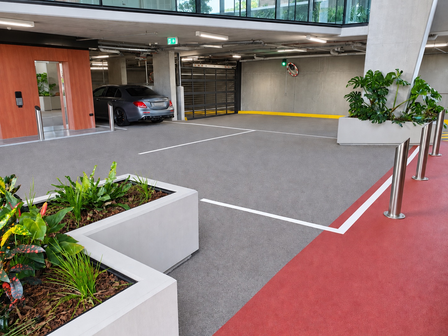 Commercial parking and access floor with a renewed light-grey surface